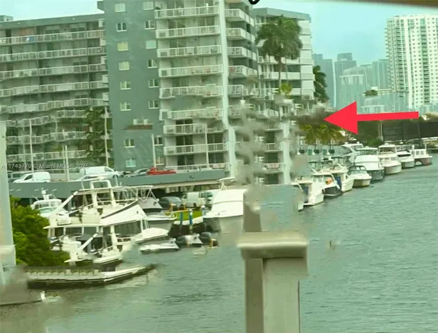 a view of swimming pool with outdoor seating
