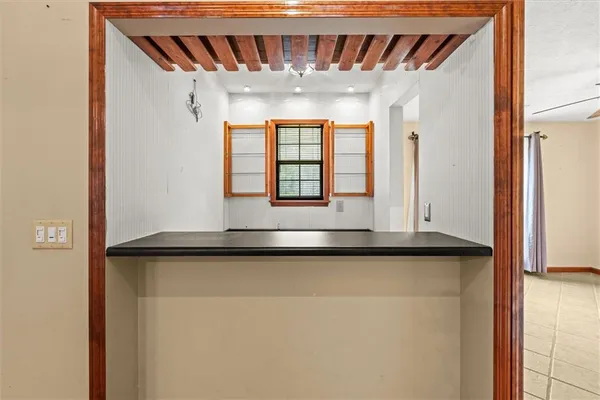 a view of a windows and chandelier in a room