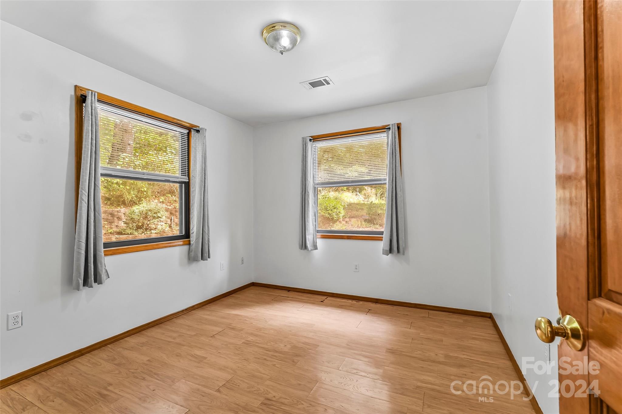 3840 Hide Away Hill Valdese, NC 28690 - Photo 20 of 21 a view of an empty room and window