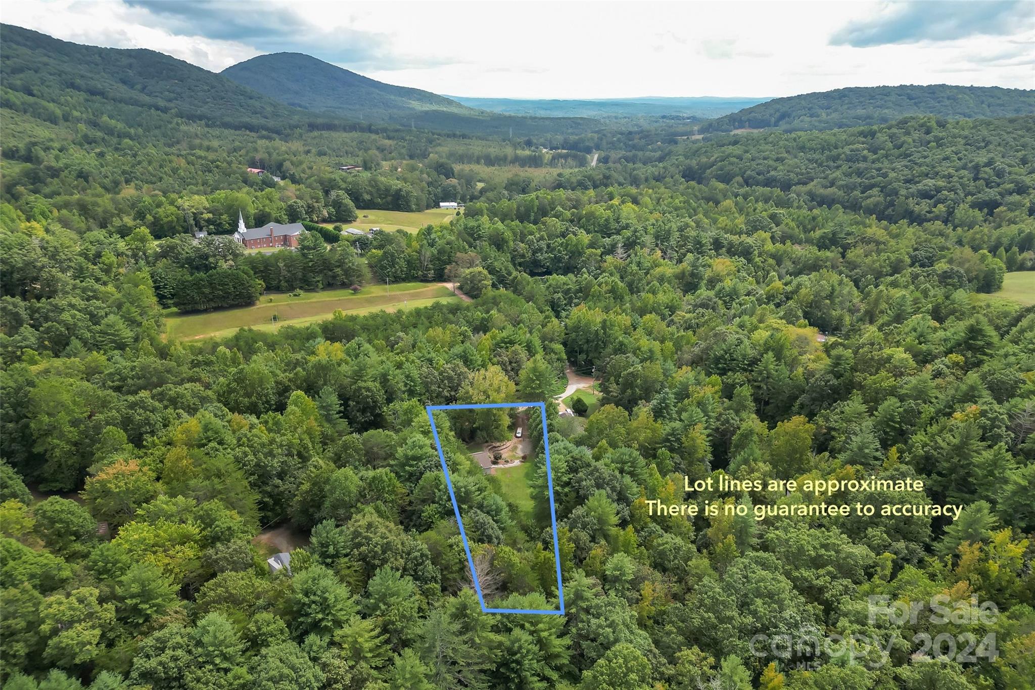 3840 Hide Away Hill Valdese, NC 28690 - Photo 21 of 21 a view of a forest with a street