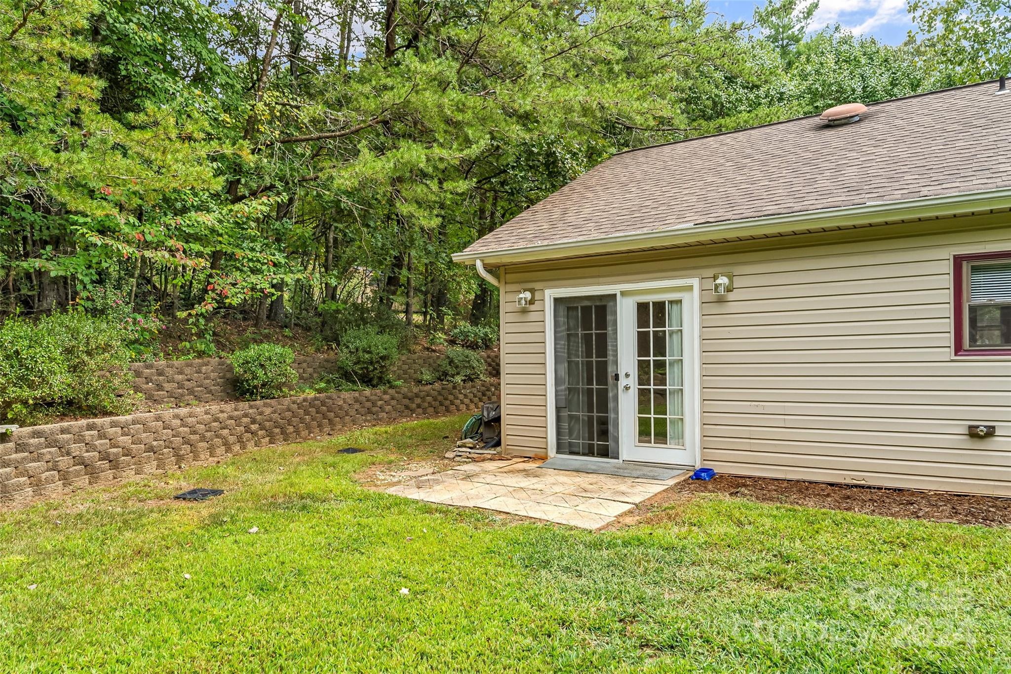 3840 Hide Away Hill Valdese, NC 28690 - Photo 6 of 21 a view of a white house with a yard
