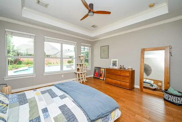 an empty room with windows and entryway