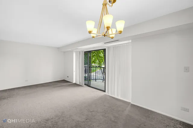 a view of a chandelier in a room