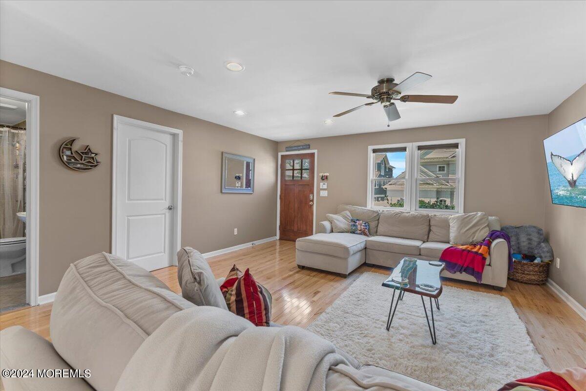 54 Metedeconk Road Brick, NJ 08723 - Photo 12 of 35 a living room with furniture and a large window