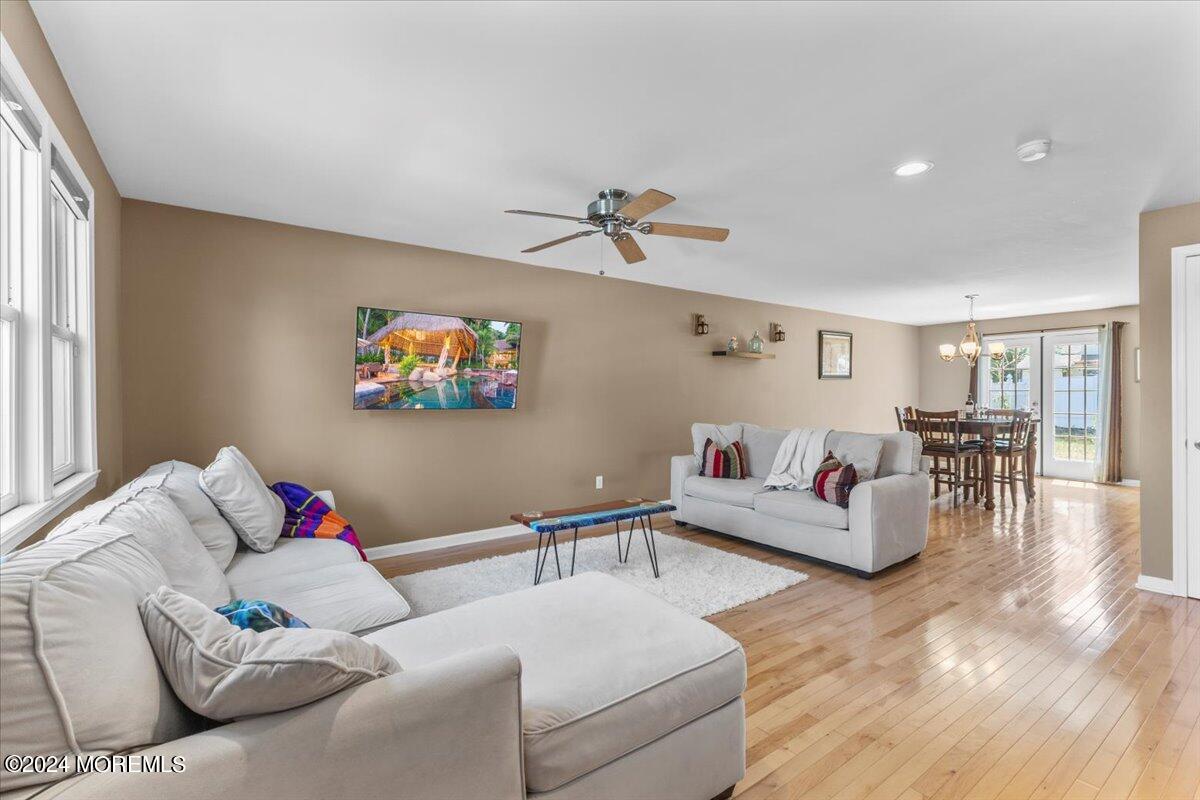54 Metedeconk Road Brick, NJ 08723 - Photo 13 of 35 a living room with furniture and a flat screen tv