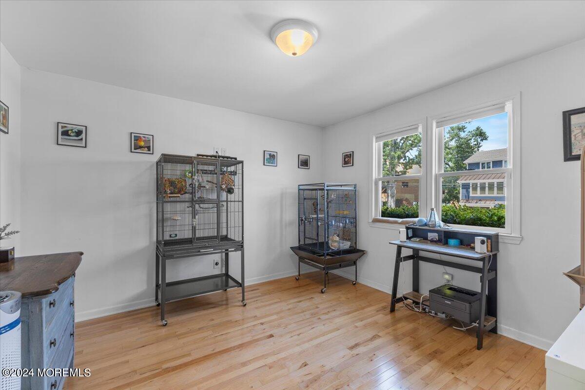 54 Metedeconk Road Brick, NJ 08723 - Photo 21 of 35 a view of a workspace with furniture and a window
