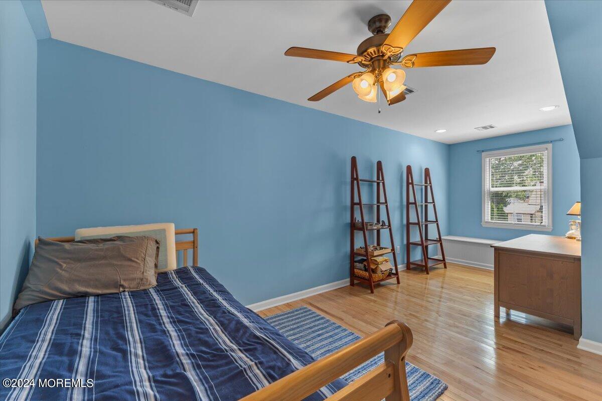 54 Metedeconk Road Brick, NJ 08723 - Photo 27 of 35 a bedroom with furniture and a window