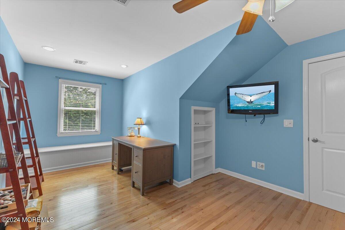 54 Metedeconk Road Brick, NJ 08723 - Photo 28 of 35 a view of a workspace with furniture and a window