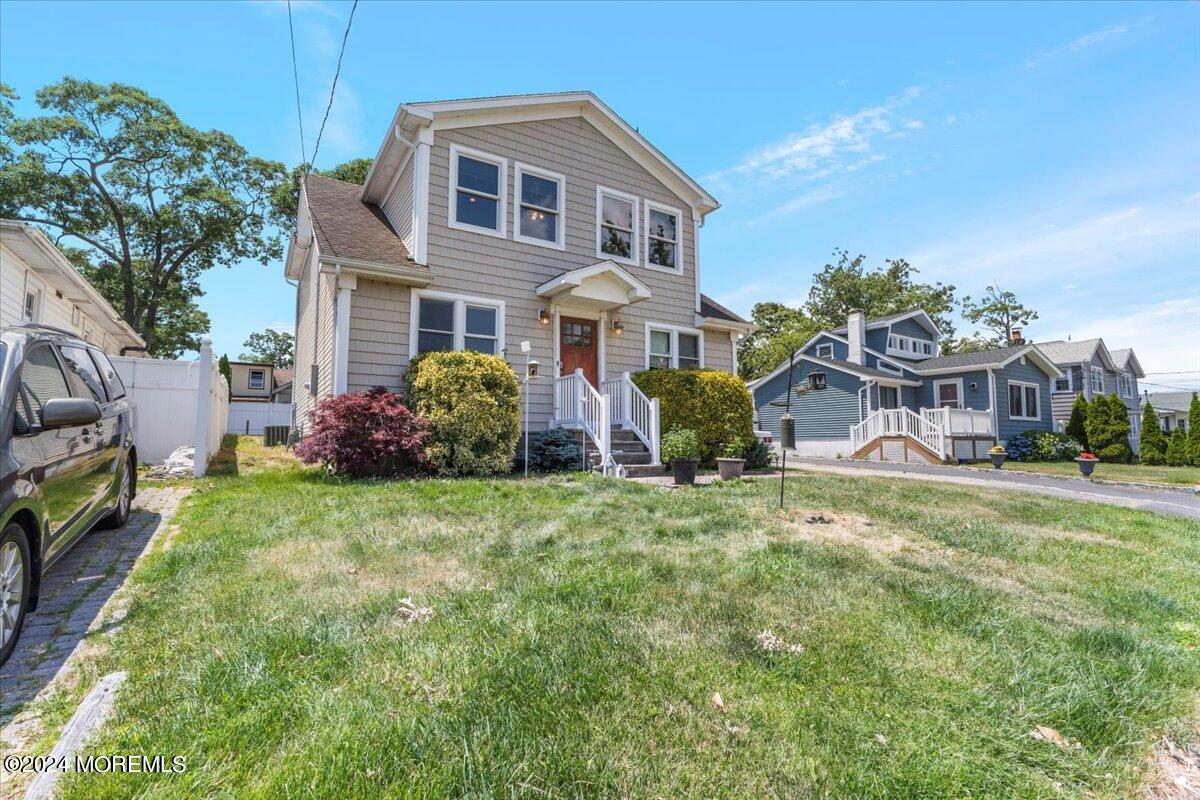 54 Metedeconk Road Brick, NJ 08723 - Photo 3 of 35 a front view of a house with a garden