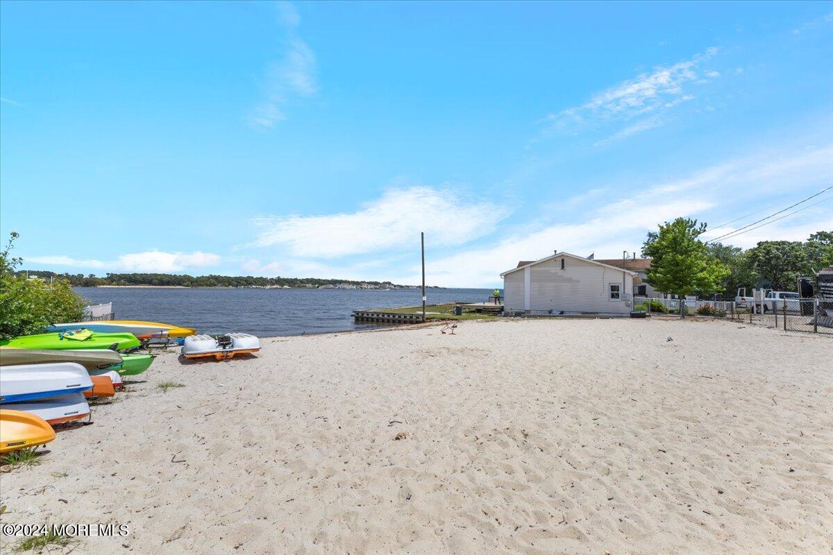 54 Metedeconk Road Brick, NJ 08723 - Photo 35 of 35 swimming pool view with a lake view