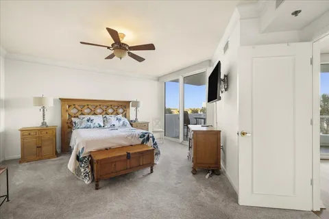 a view of a livingroom with furniture and flat screen tv
