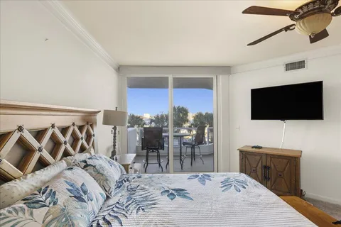 a large bathroom with a granite countertop sink a mirror and a shower