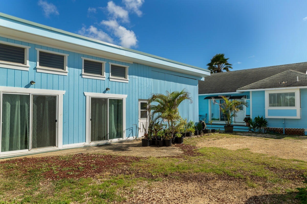 1111 Kealoha Road Kapaa, HI 96746 - Photo 3 of 30 a front view of a house with a yard