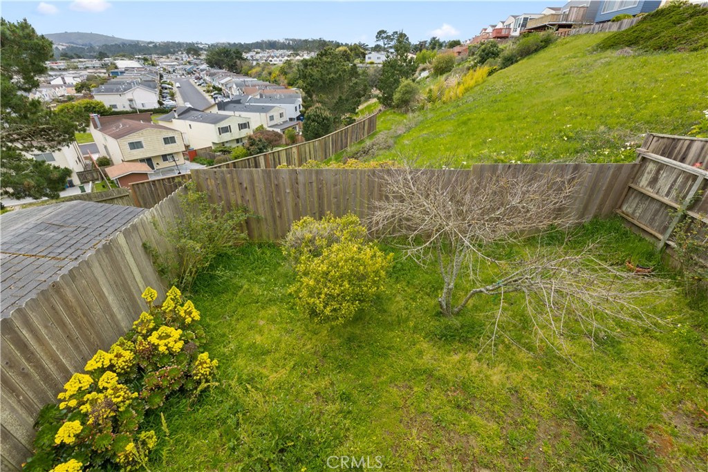 912 Gellert Boulevard Daly City, CA 94015 - Photo 20 of 21 an aerial view of residential house with an outdoor space and seating area