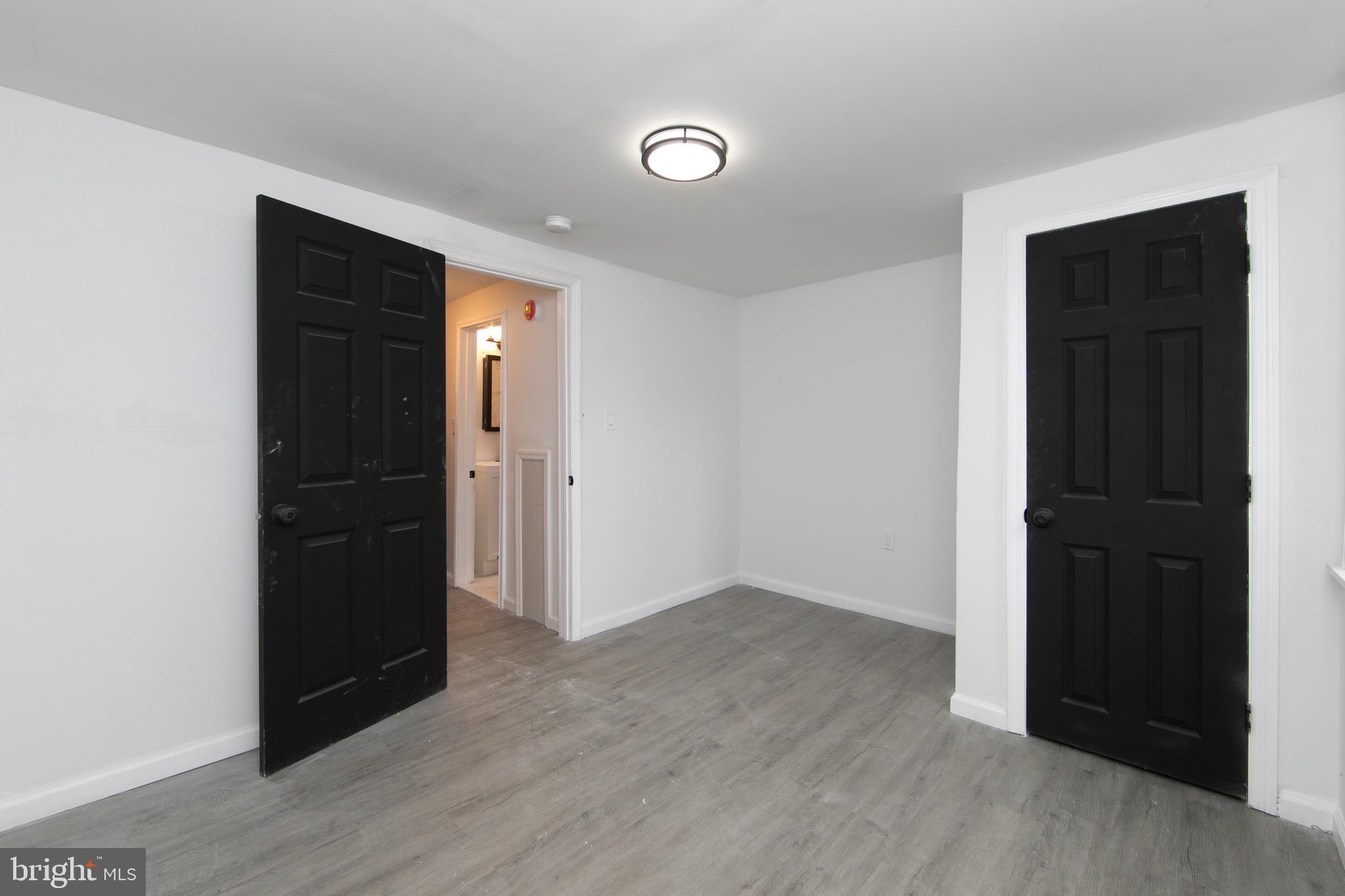 1261 South Merrimac Road Camden, NJ 08104 - Photo 19 of 27 wooden floor in an empty room