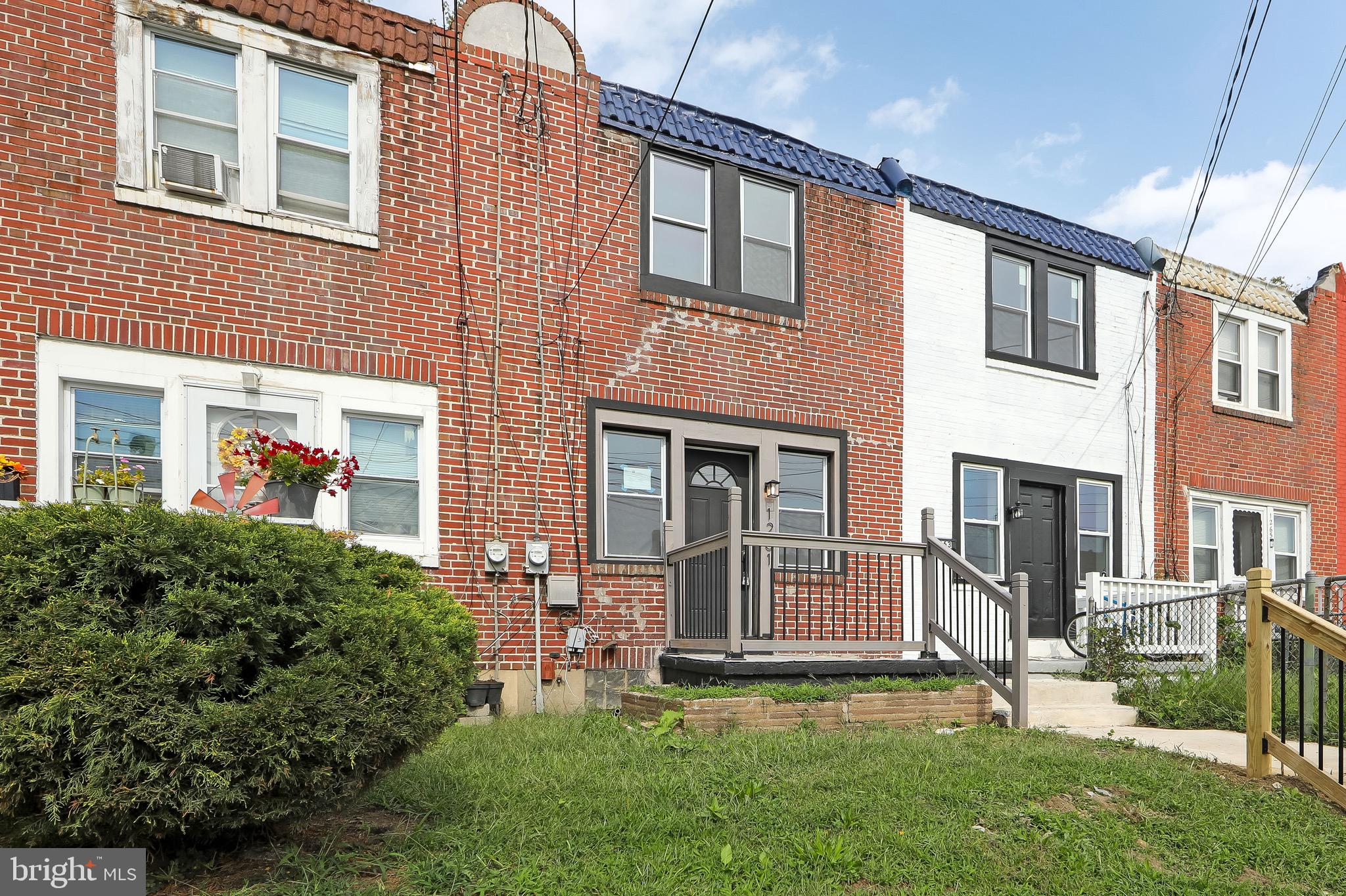 1261 South Merrimac Road Camden, NJ 08104 - Photo 23 of 27 front view of a house with a yard
