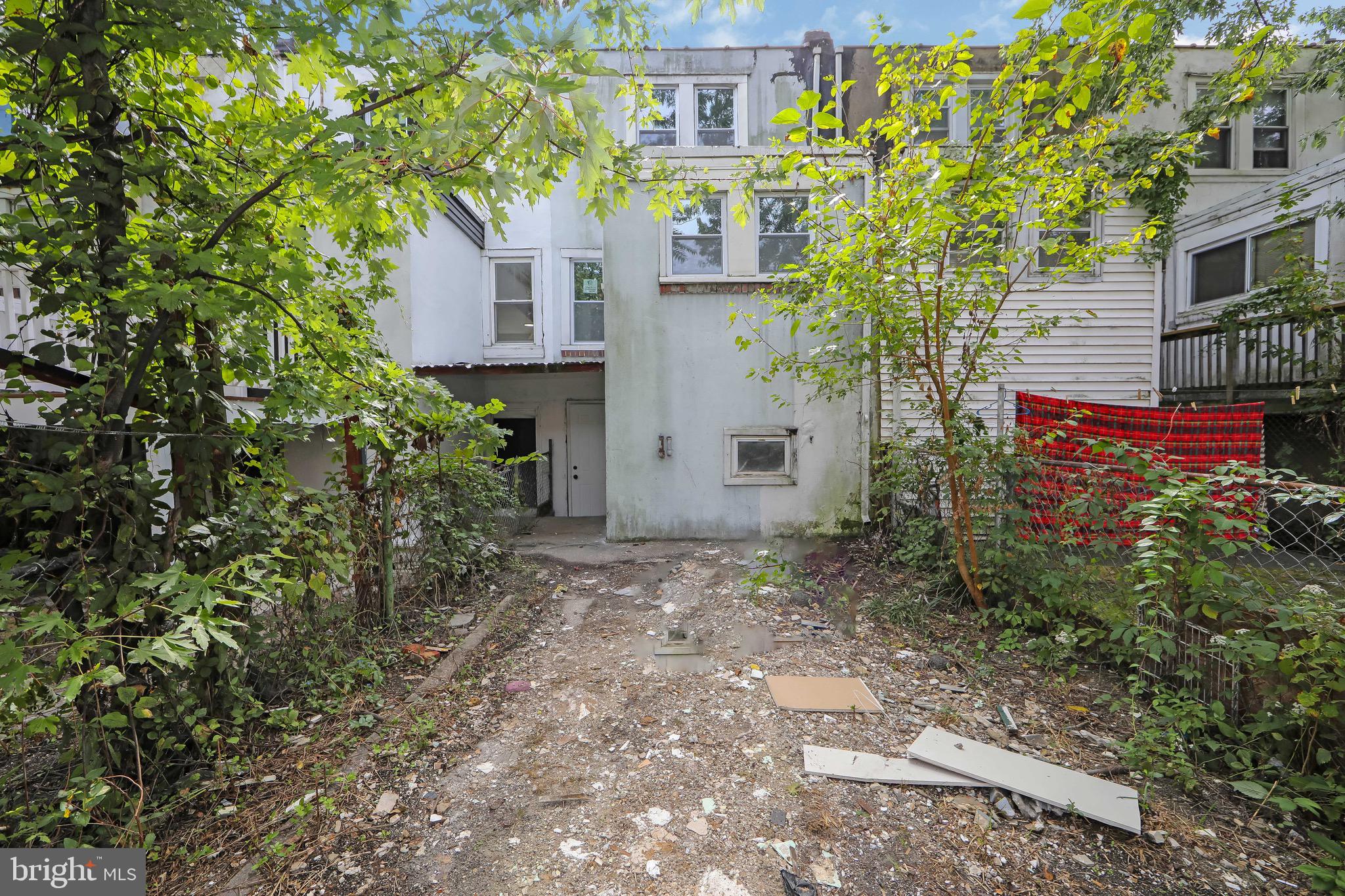 1261 South Merrimac Road Camden, NJ 08104 - Photo 27 of 27 a view of a house with a yard and tree s