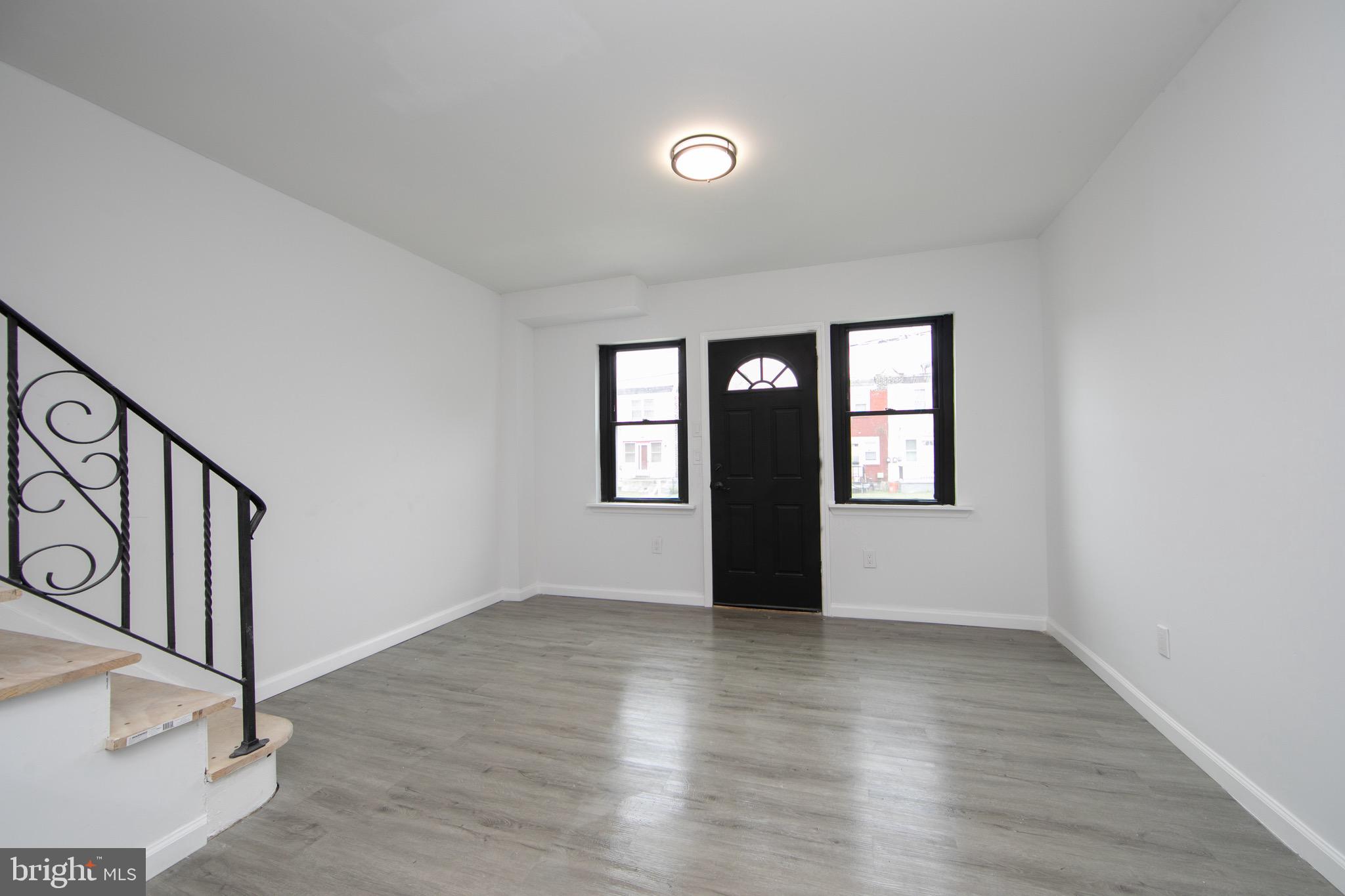1261 South Merrimac Road Camden, NJ 08104 - Photo 3 of 27 wooden floor in an empty room