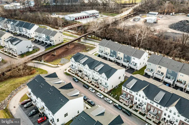an aerial view of a swimming pool patio and mountain view