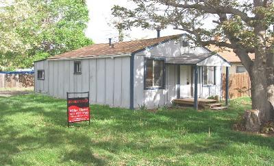 1902 South Decatur Street Denver, CO 80219 - Photo 1 of 1 a backyard of a house with table and chairs