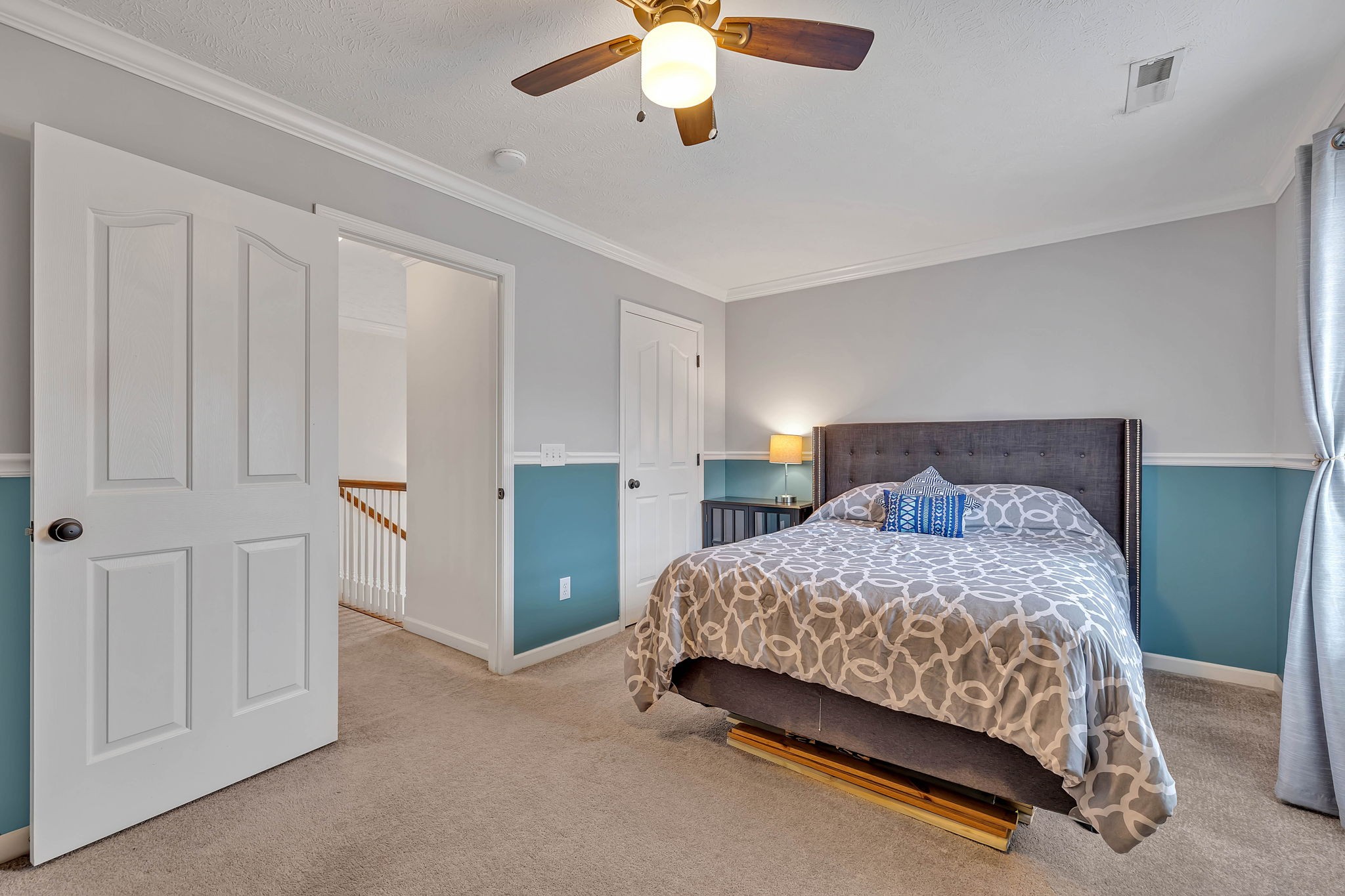 3309 Cornerstone Drive Murfreesboro, TN 37128 - Photo 30 of 43 a bedroom with a bed and a chandelier