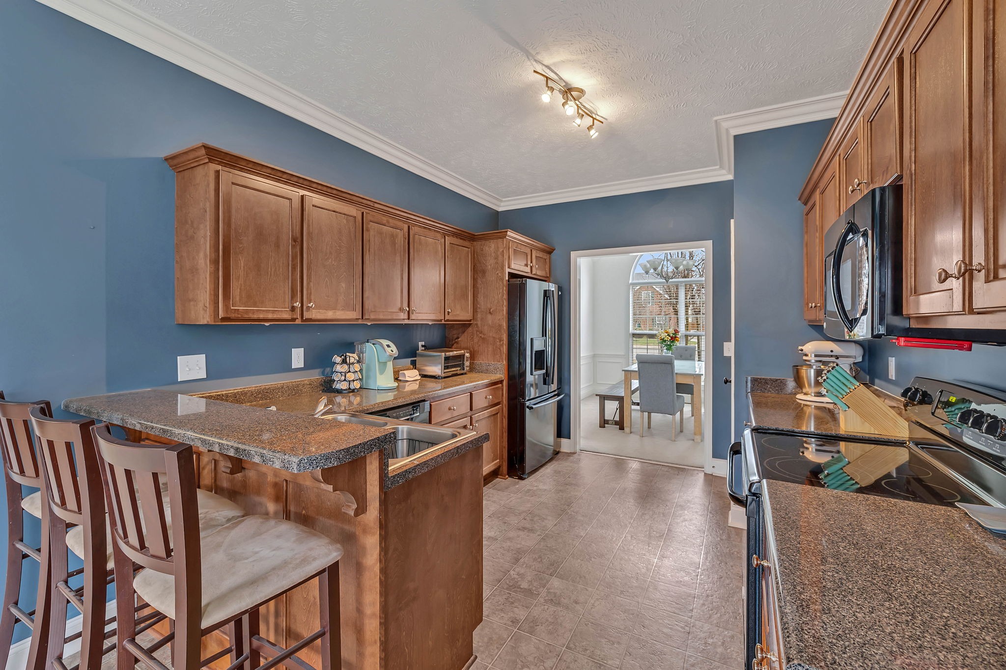 3309 Cornerstone Drive Murfreesboro, TN 37128 - Photo 10 of 43 a kitchen that has a table and chairs in it