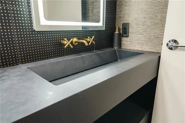 a large bathroom with a tub and a shower