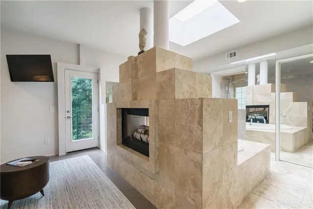 a view of backyard with outdoor seating and green space