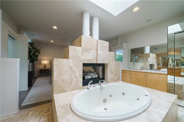 a view of a pathway with a garden