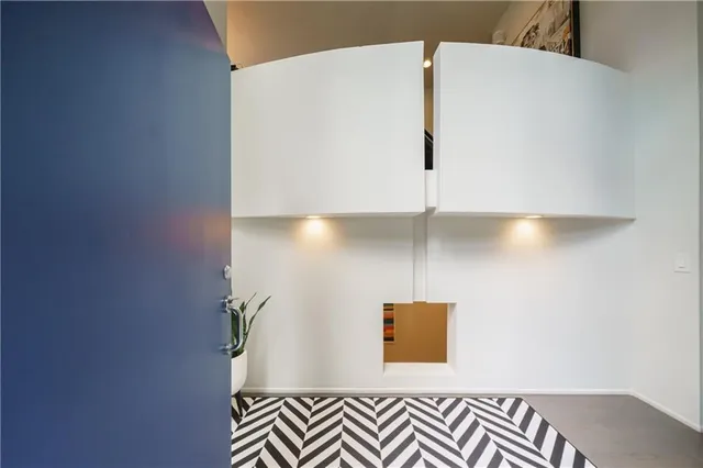 a view of entryway with a window and stairs