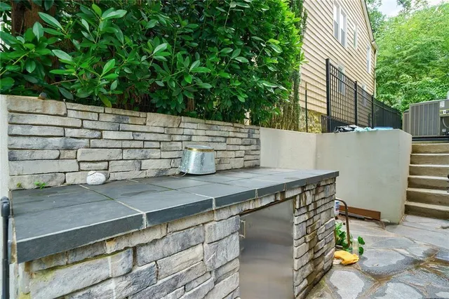 a workspace with furniture and wooden floor