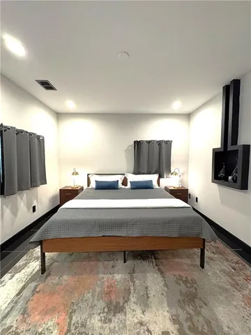 a view of a kitchen with a stove cabinets and furniture