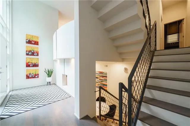 a room with furniture and a large window