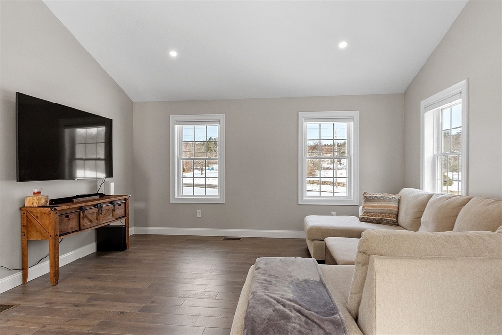 80 Fitchburg Road Ashburnham, MA 01430 - Photo 8 of 24 a living room with furniture and a flat screen tv