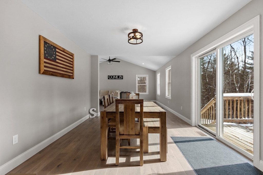 80 Fitchburg Road Ashburnham, MA 01430 - Photo 9 of 24 a view of a hallway with wooden floor and dining room