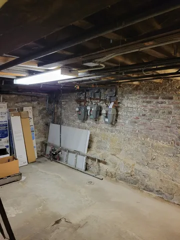 a view of parking garage with cars