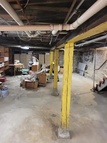 a room with storage and utility