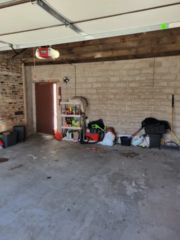 a living room with a fireplace furniture and a fireplace