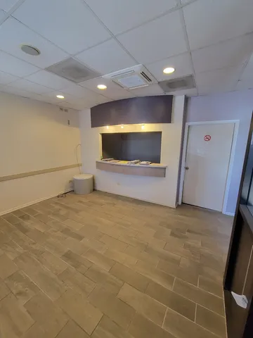 a view of a livingroom with a microwave