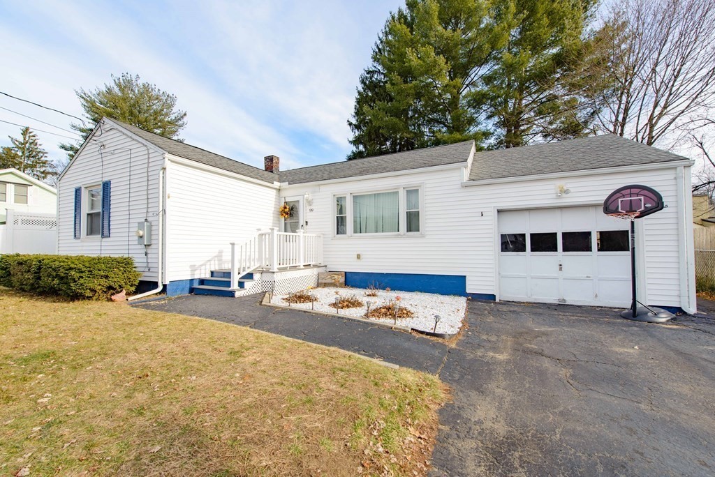 99 Merrill Road Springfield, MA 01119 - Photo 2 of 30 a view of a house with backyard and sitting area