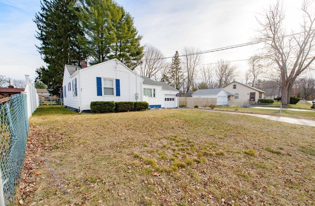 99 Merrill Road Springfield, MA 01119 - Photo 30 of 30 a view of a house with a yard