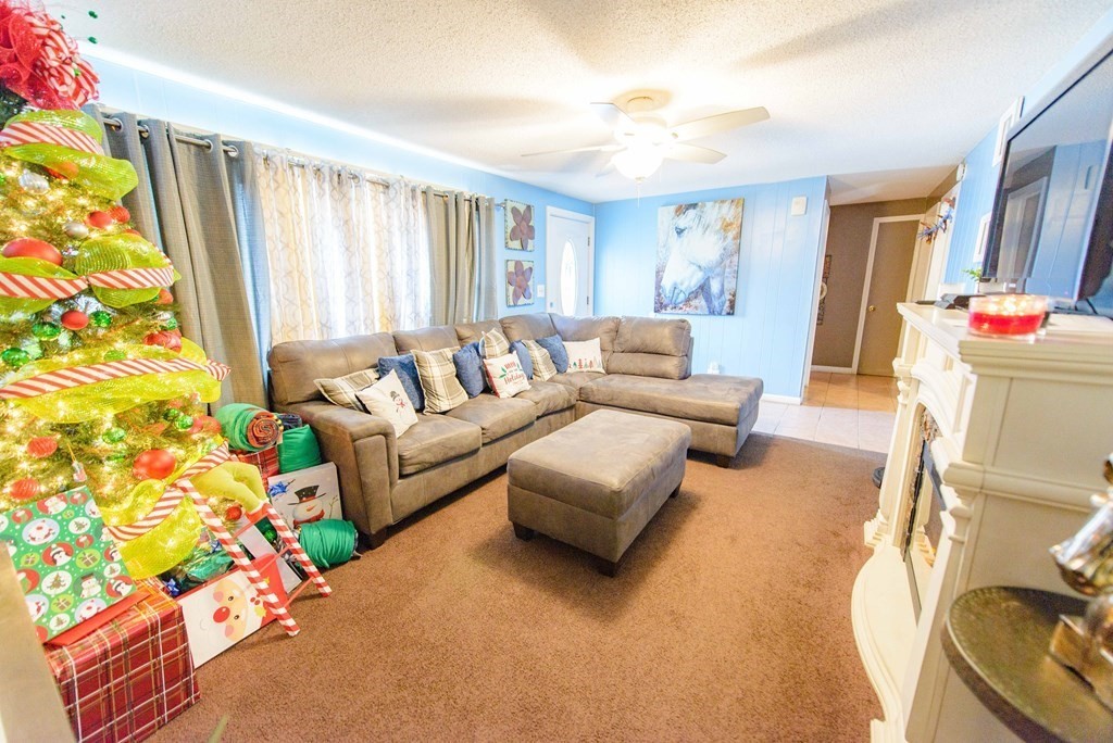 99 Merrill Road Springfield, MA 01119 - Photo 5 of 30 a living room with furniture and a large window