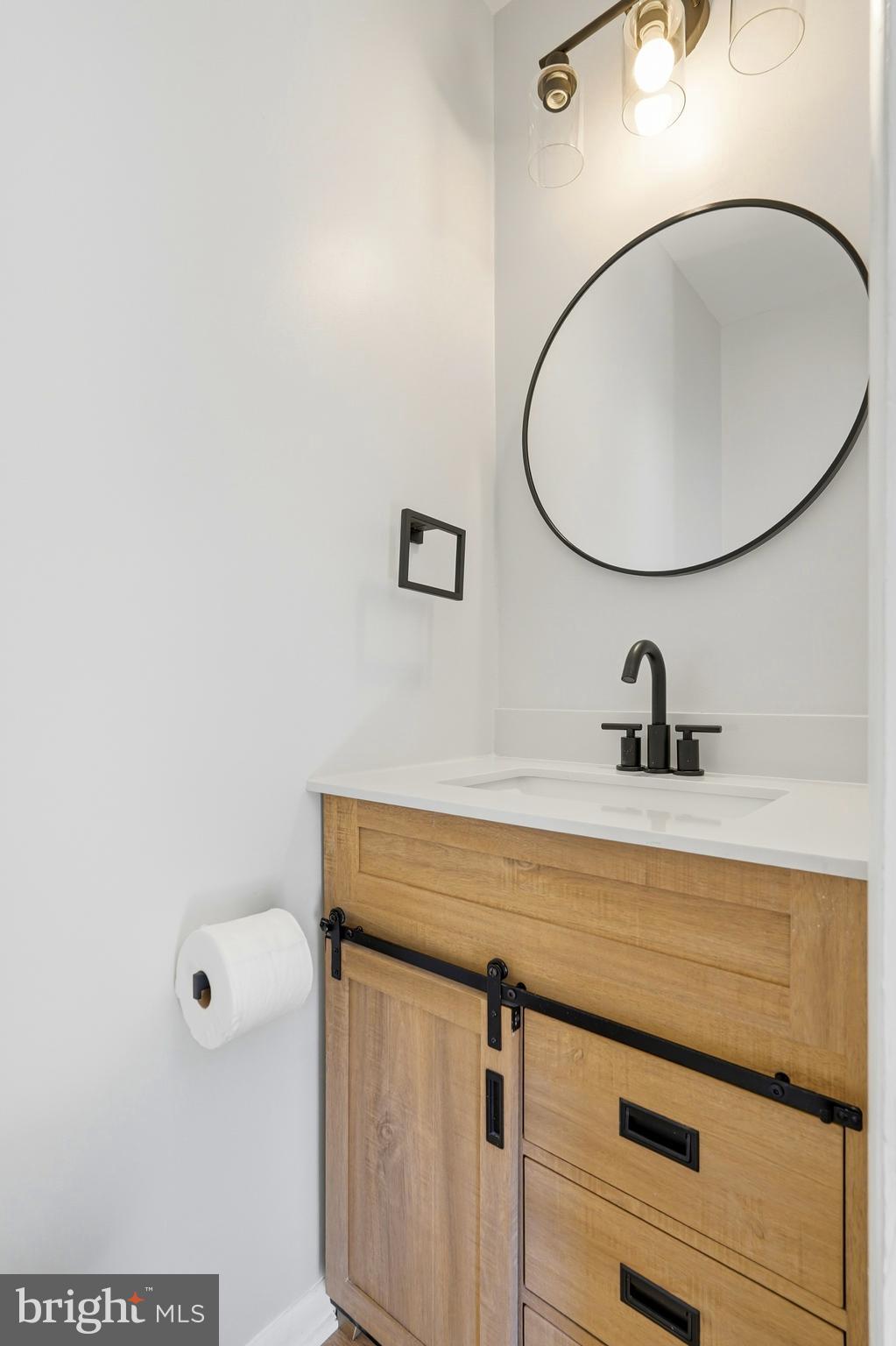 3682 Masthead Trail Triangle, VA 22172 - Photo 43 of 53 a bathroom with a sink and mirror