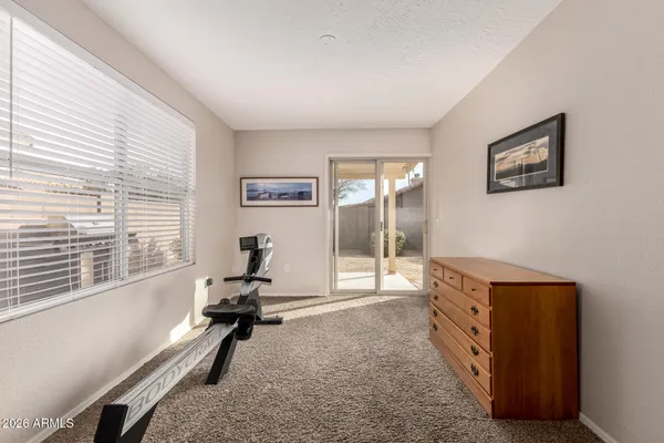 a view of a workspace with furniture