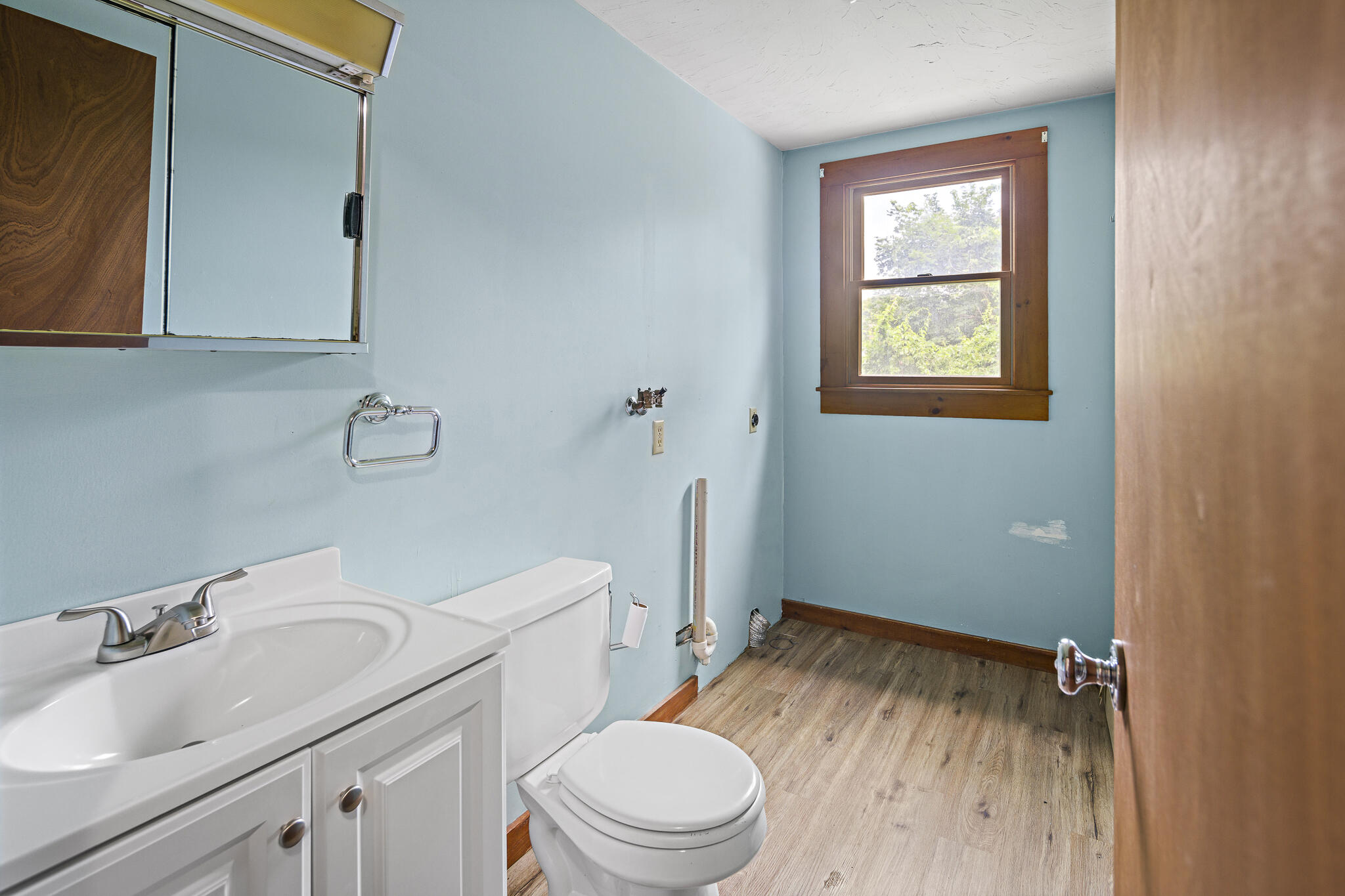 First floor half bath +laundry hookup