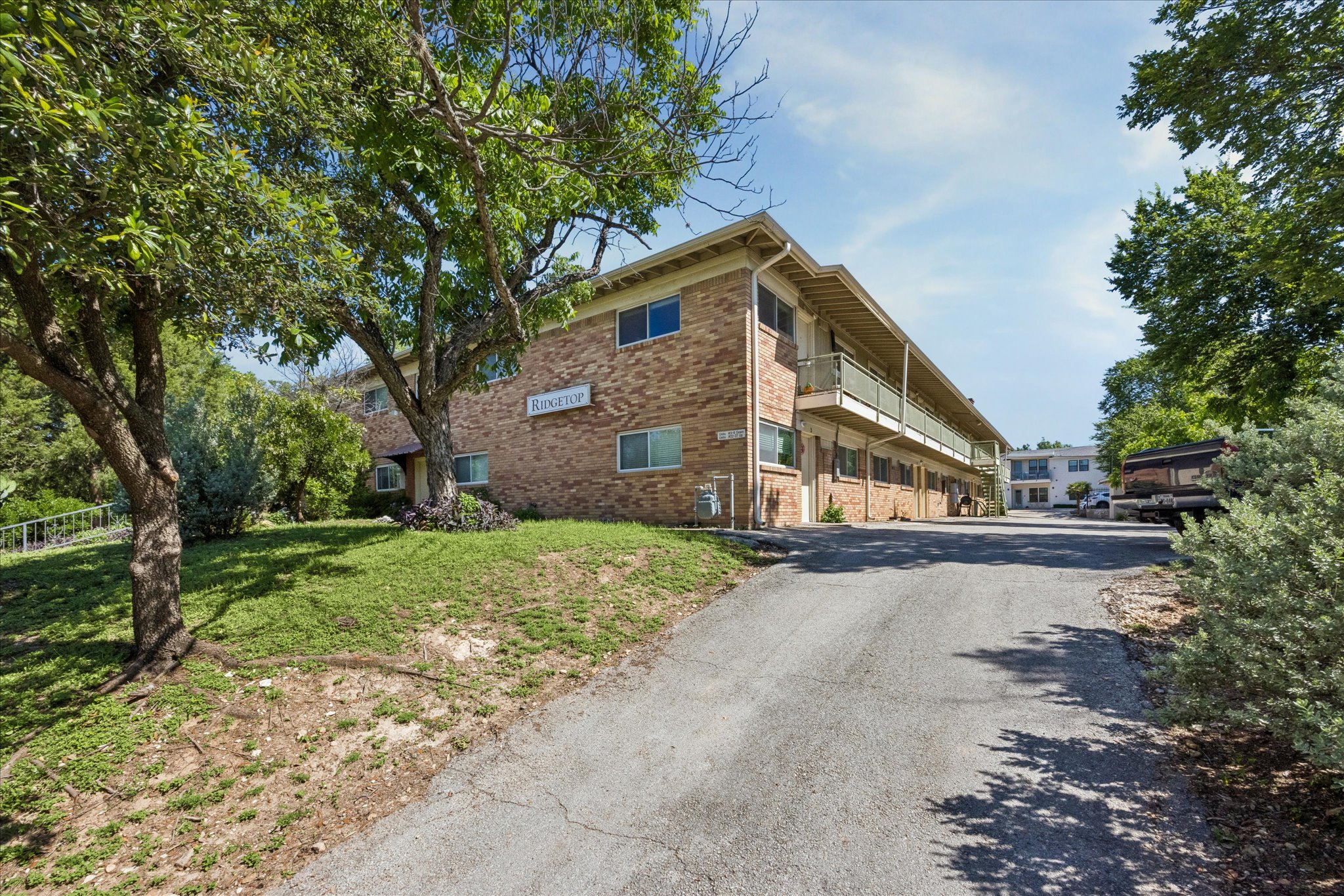 304 East 33rd Street, Unit 4 Austin, TX 78705 - Photo 2 of 15 Brick facade 2-story building