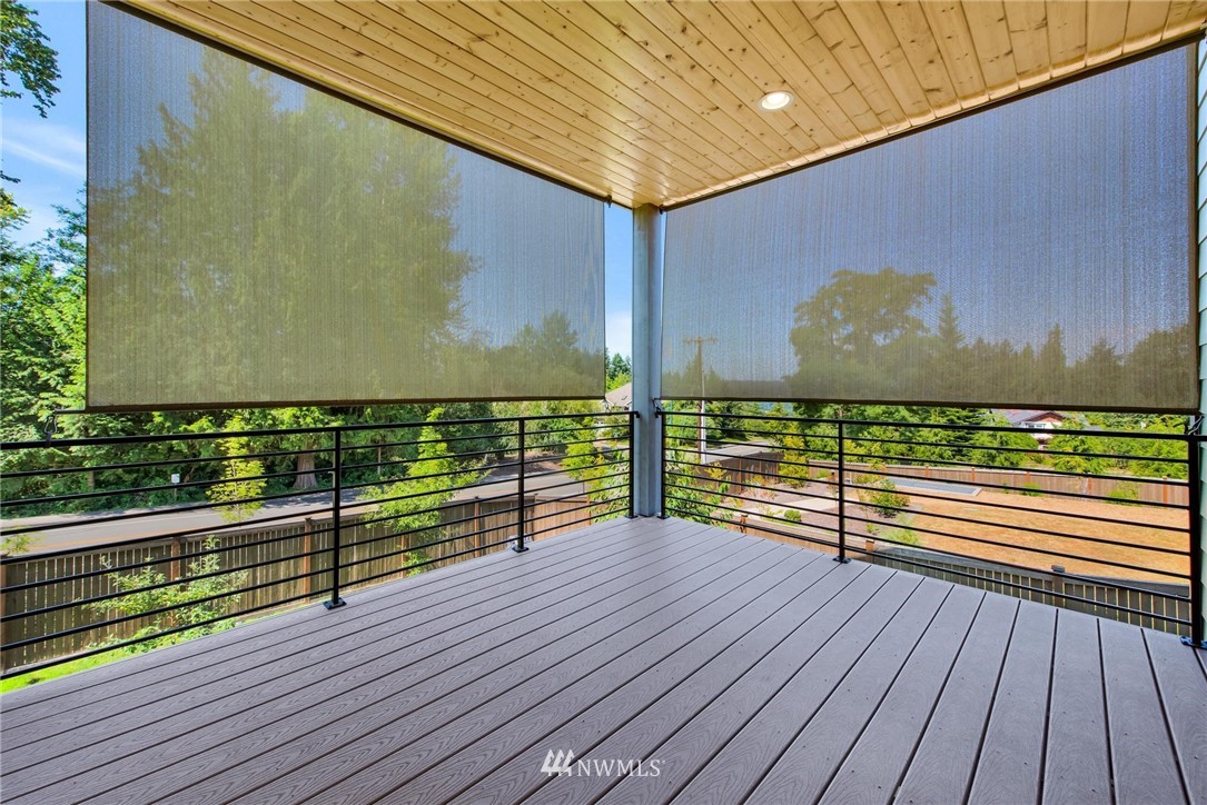 27418 Northeast 152nd Court Duvall, WA 98019 - Photo 11 of 40 a view of a balcony with wooden floor