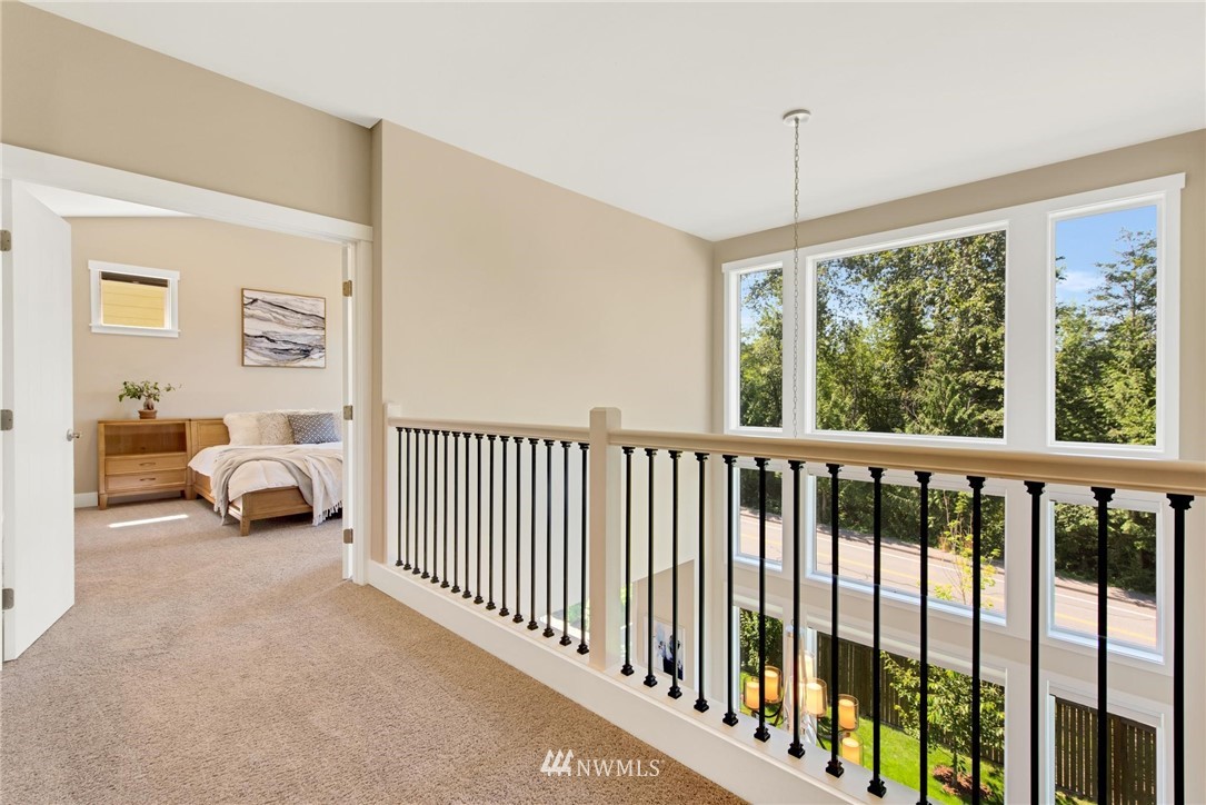 27418 Northeast 152nd Court Duvall, WA 98019 - Photo 17 of 40 a view of a balcony with furniture and windows