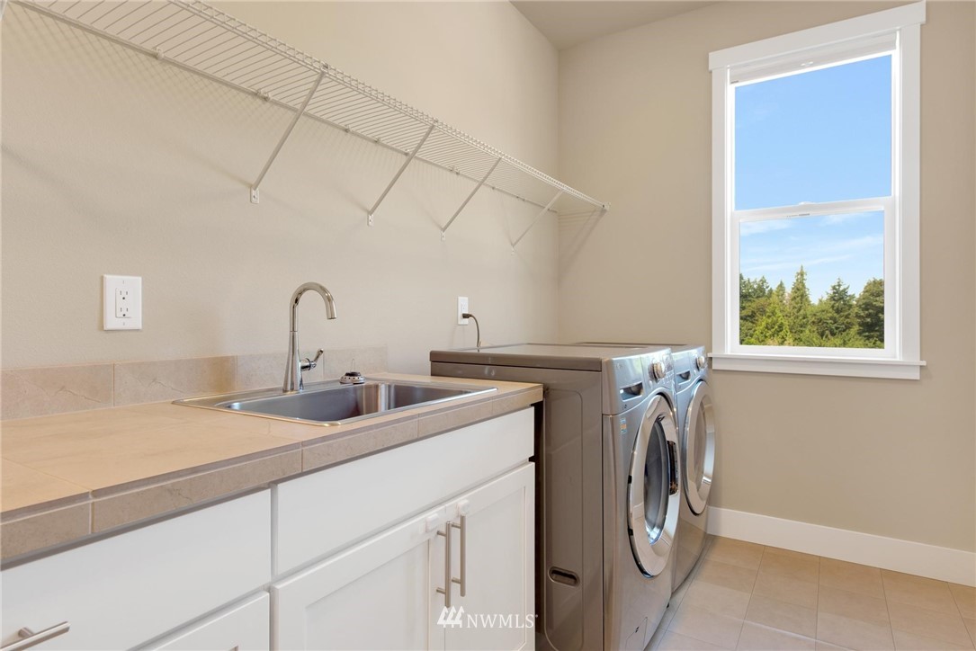 27418 Northeast 152nd Court Duvall, WA 98019 - Photo 25 of 40 a utility room with dryer and washer
