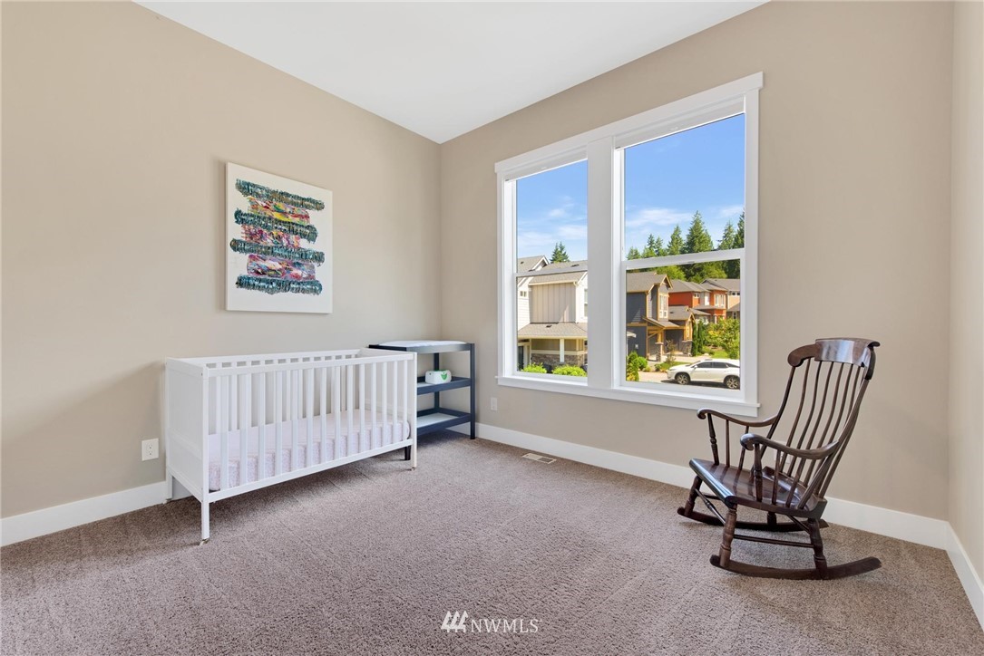 27418 Northeast 152nd Court Duvall, WA 98019 - Photo 26 of 40 a view of livingroom with furniture and windows